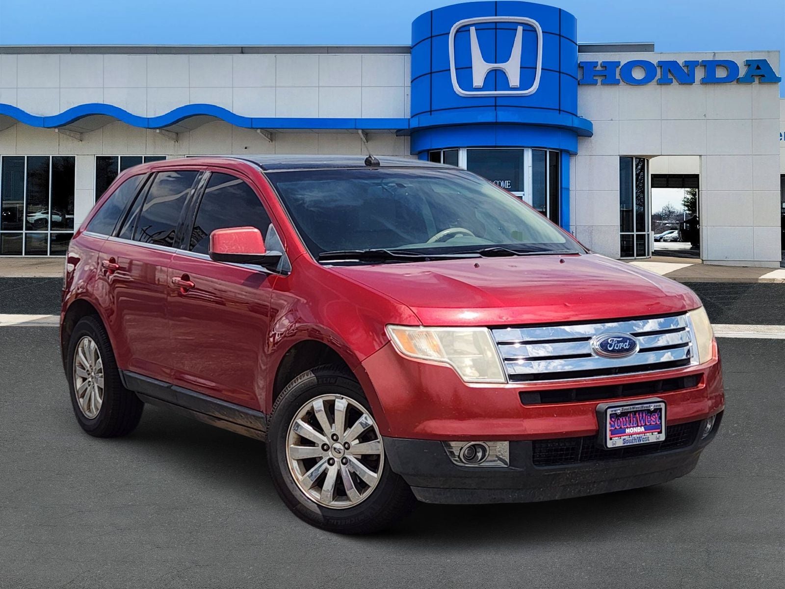2009 Ford Edge Limited in Redfire Clearcoat Metallic — front three-quarter view